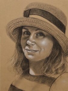 Madelyn in Hat number 2 11x14 Charcoal on Kraft